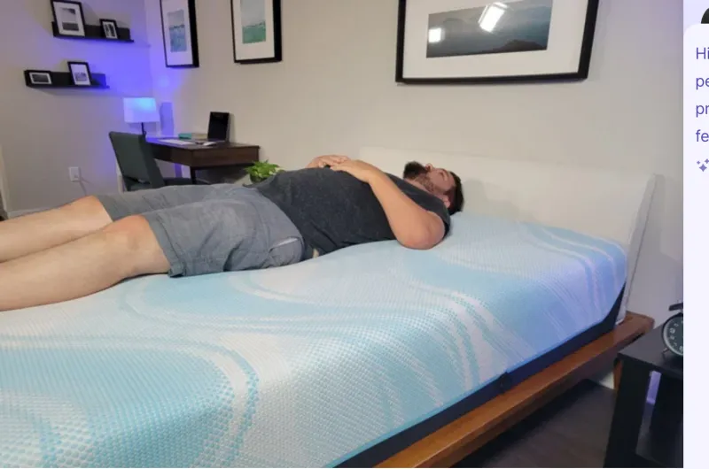 Person lying on the Tempur-Pedic LuxeBreeze mattress